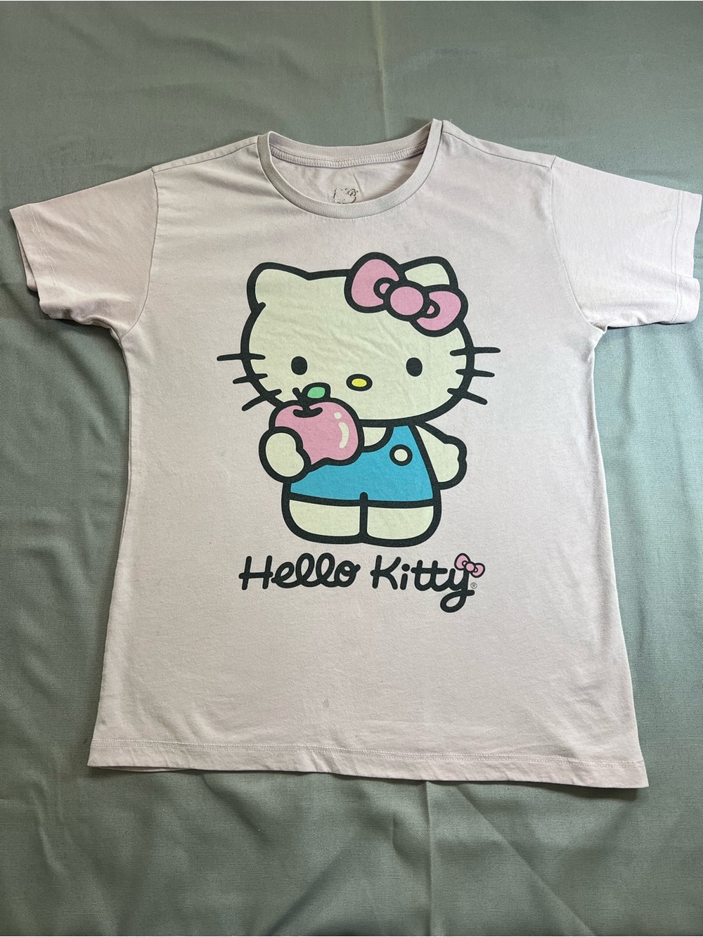 Hello Kitty Light Pink Tee with Blue Outfit Graphic